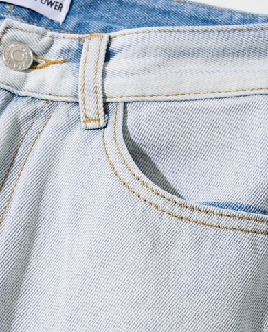 מכנסי ג'ינס קרועים עם שיפוע חדש לנשים